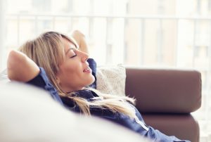 comfortable-woman-on-couch